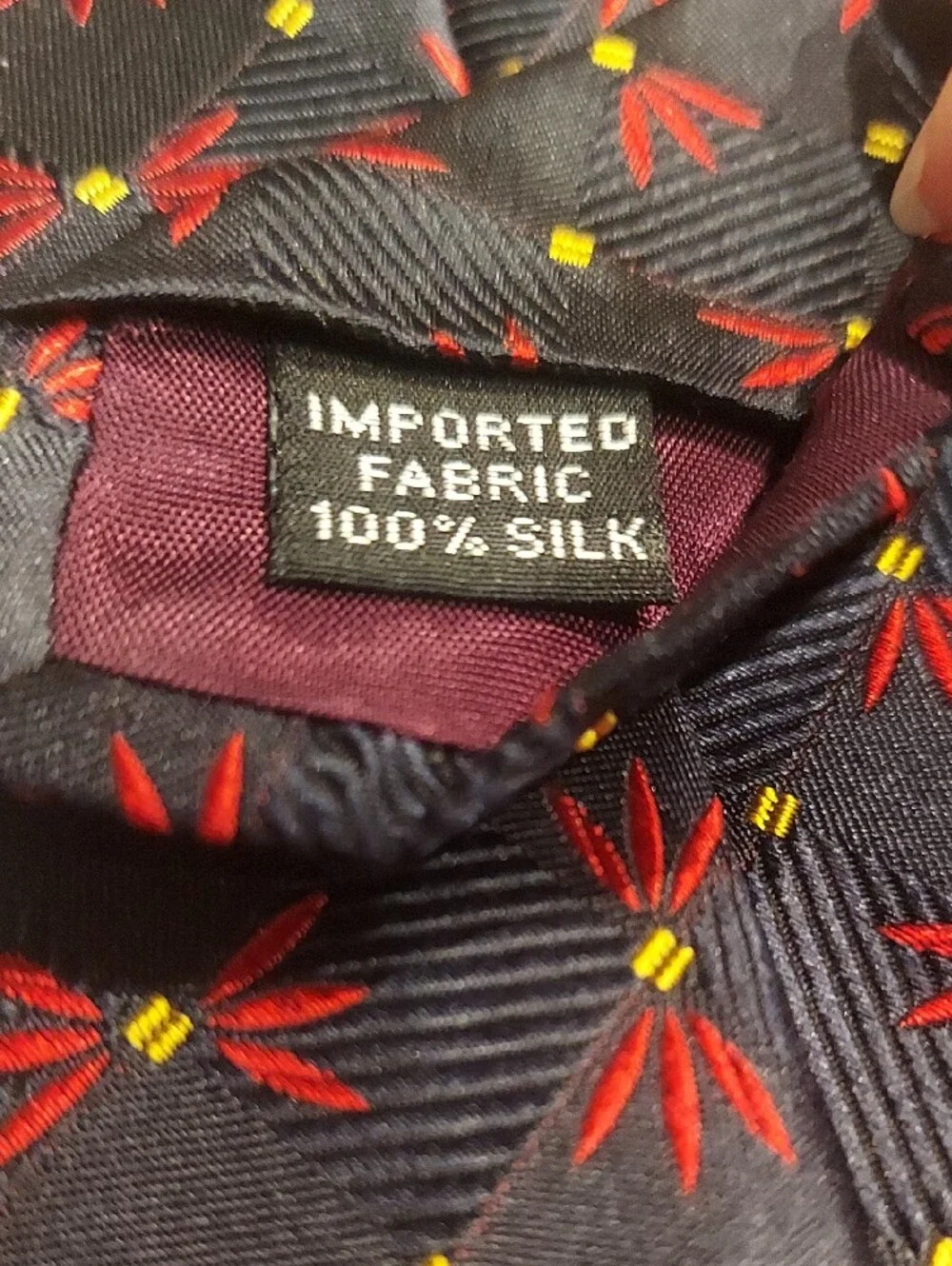 Vintage Geoffrey Beene Silk Navy Tie with Red Floral Pattern and Yellow Accents